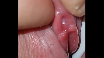 Discovering her petite clitoris through her stunning bare patch, leading to her intense orgasm